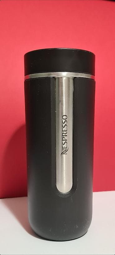 Sobne biljke: Nespresso Nomad termo putna šolja u crnoj boji.  Predmet nije nov, ali — 1
