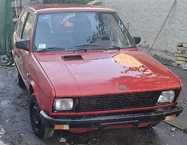 olovka za ogrebotine na autu: Yugo 55, crvena boja, trovratni hečbek. Ključne karakteristike: - — 3
