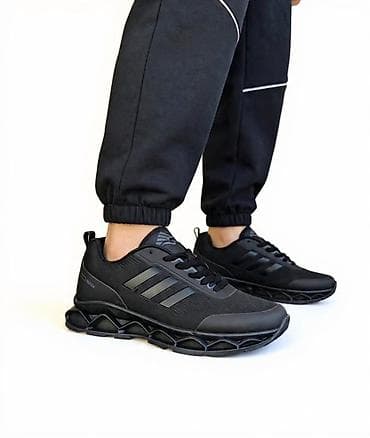 Patike: Muške sportske patike, crne boje, sa naglašenim amortizacionim đonom u — 1