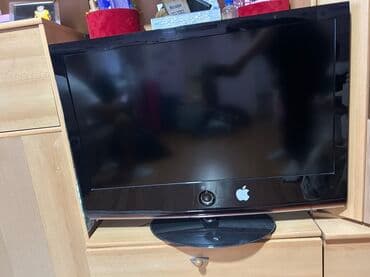 lg srbija: LG LCD televizor, dijagonala oko 32 inča. Crni sjajni okvir sa — 1