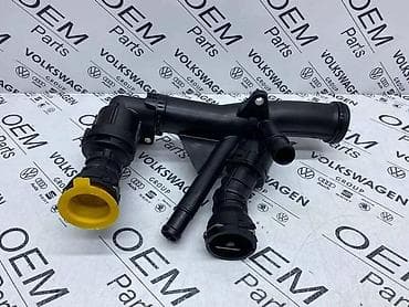 auto delovi loznica: TERMOSTAT SA RACVOM ZA VOLKSWAGEN TIGUAN, TOURAN, GOLF 7 . - 04L 121 — 2