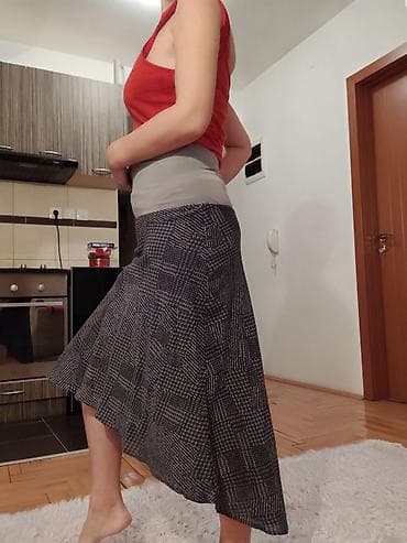 prsluk s: Asimetrična suknja sa elastičnim pojasom - Model: midi dužina — 2