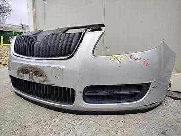 skoda oktavija: PREDNJI BRANIK BOJA-SIVA ZA ŠKODA ROOMSTER OD 2006. DO 2015. GOD. | — 1