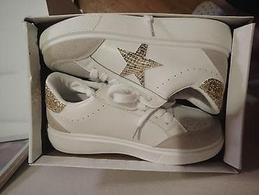 puma bele patike zenske: Bele patike sa zlatnim detaljima – moderno i udobno - Dizajn: bele — 1