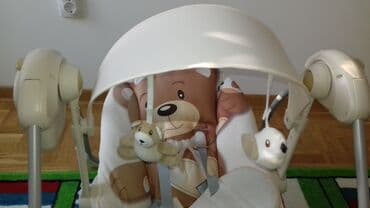 Ugaone garniture: Prodajem ljuljasku za bebe. Nova, samo otpakovana. Cena: 8000 dinara — 5