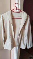 haljine od skube: Ženska jakna/sako u bež boji. Kratkog je kroja, sa blagim strukiranjem — 1