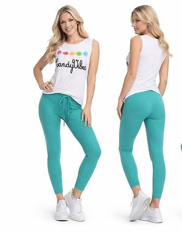 kargo pantalone: Helanke u tirkiznoj boji sa vezivanjem u struku. Izrađene su od — 1