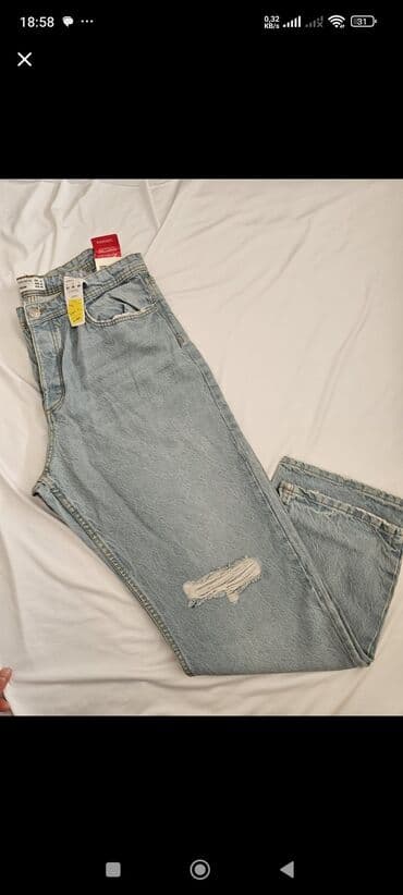 Kaputi i mantili: Muške farmerke – više modela sa ispranim i pocepanim efektom - — 3