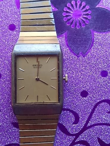 pepco zrenjanin: Seiko kvarcni ručni sat – pravougaono kućište i dvobojna metalna — 1