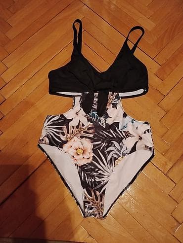 Jednodelni ženski kupaći kostim sa dvodelnim efektom: - Gornji deo u