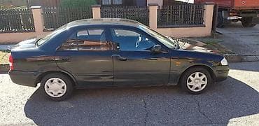 odjavljen auto: MAZDA 323 - KOMPLETAN AUTO U DELOVIMA | MAZDA 323 sedan polovni — 3