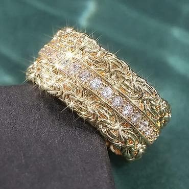 van cleef nakit cena: Zlatni prsten široke burme sa bogatim pletenim motivom i centralnim — 3