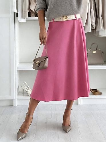 Satenasta midi suknja A-kroja Ovaj prelep model suknje nam je upravo na lalafo.rs Satenasta midi suknja A-kroja Ovaj prelep model suknje nam je upravo