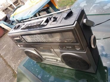 Headphones: Universum ctr 2304u. -radio ispravno. -dek premotava levo i desno — 8