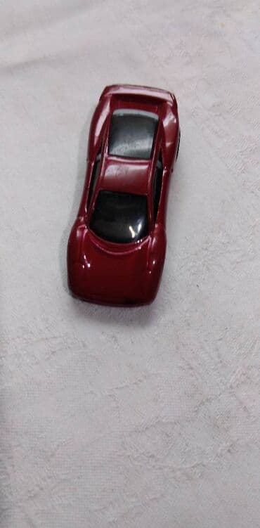 sat na navijanje: Hot Wheels Jaguar 1992,oko Malaysia zafarban na pr.delu — 2