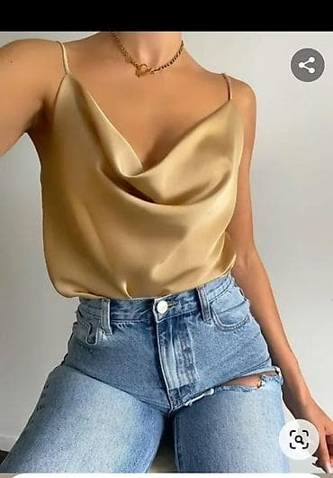 majice bre: Satenski krop top sa tankim bretelama
1550 din
S M L — 4