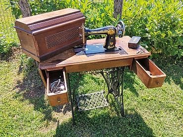 Singer komplet sve sa fotki u kompletu samo prelepa preuzimanje