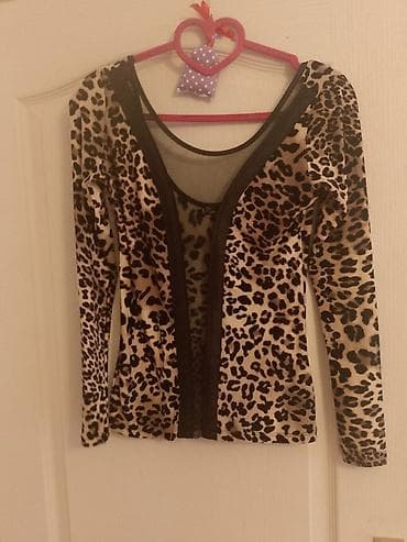 Haljine: Ženska bluza dugih rukava sa leopard printom. - Kroj: pripijeni, duži — 2