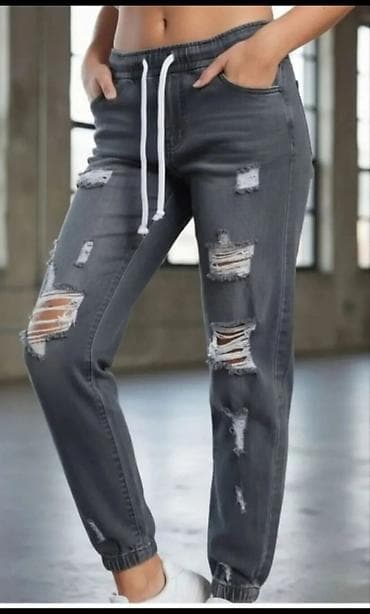 Ženske pantalone – sivi “jogger” džins sa pocepanim detaljima -