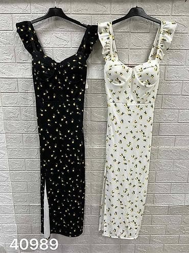 karo haljina: Ženska midi haljina s cvetnim printom
2400 din — 6