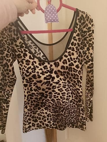 Haljine: Ženska bluza dugih rukava sa leopard printom. - Kroj: pripijeni, duži — 3