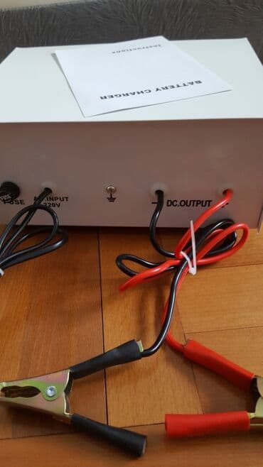 adapter za auto upaljač sa 220v na 12v: Punjac akumulatora 12V novo — 3