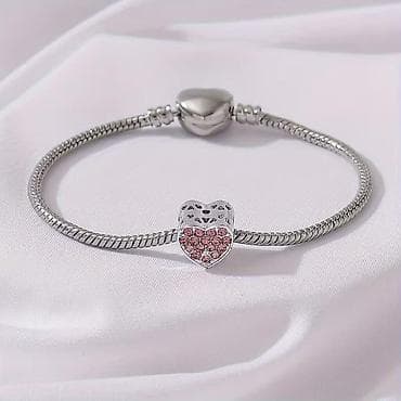 van cleef narukvica cena: Srebrnasta narukvica sa šarmom u obliku srca - Elegantna „snake — 6