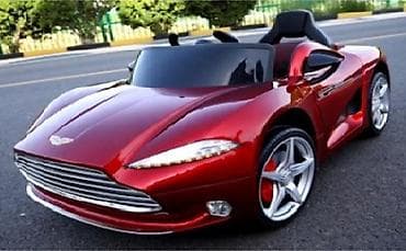 novogodisnje maske: Auto Aston Martin 12V – crveni metalik Opis: - Dečiji električni — 1