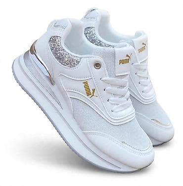 Ženske patike Puma – bele sa zlatnim detaljima i šljokičastim