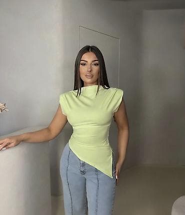 gucci majice original: Asimetrična ženska majica bez rukava
1400 din — 1