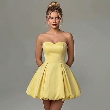 Kratka elegantna haljina bez bretela
2400 din
S M L