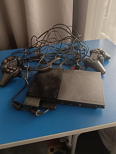 Sony PlayStation 2 Slim (SCPH-90004) – komplet za igranje i karaoke -