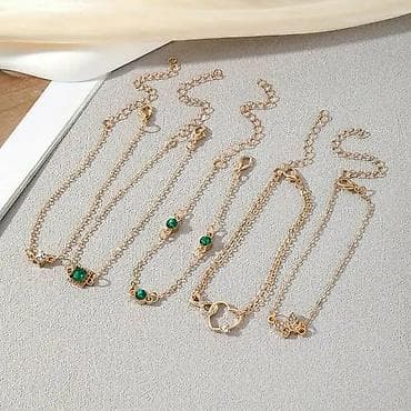 muska torba na rame: Set zlatno-toniranih narukvica – 6 kom - Delikatne lančiće u zlatnoj — 2