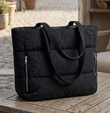 mona kožne torbe: Prostrana crna tote torba modernog, pufnastog dizajna. - Materijal — 1
