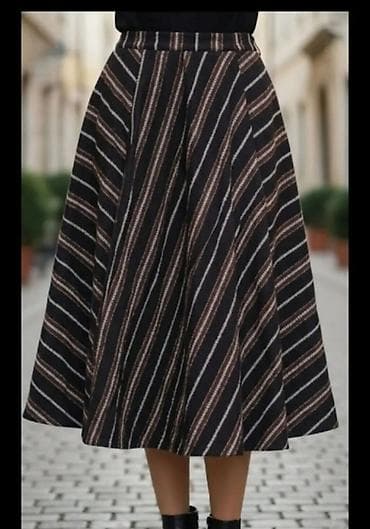 Suknja A-kroja, dužine do ispod kolena, od srednje debelog tkanog