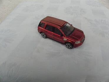 range rover igracka: Burago Land Rover Defender 2,1/ 43 ocuvan,China — 1