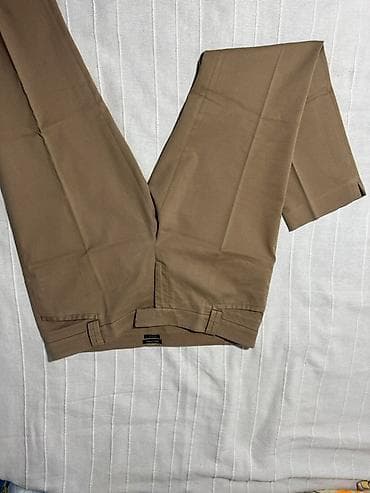 Pantalone – klasični chino/fino kroj, boja: bež/kamel. - Materijal