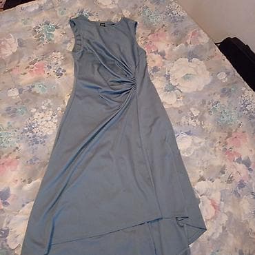 Elegantna ženska haljina bez rukava u svetloplavoj/teget nijansi