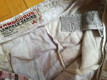 kompleti pantalone i prsluk: Muski sorc velicina 36, dužina 55, poluobim struka 45. Oštećenje — 3