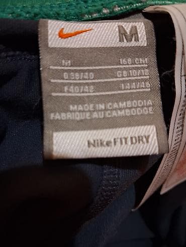 Donji deo: Nike ženske sportske pantalone – model sa širokim nogavicama - — 3