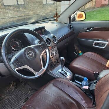 Automobili: Opel Antara – crni SUV, 5 vrata - Motor: dizel (prepoznatljiv po — 4