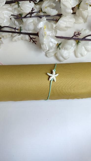 narukvice od konca: Narukvica sa morskom zvezdom - Tanka narukvica od svetloplave končane — 1