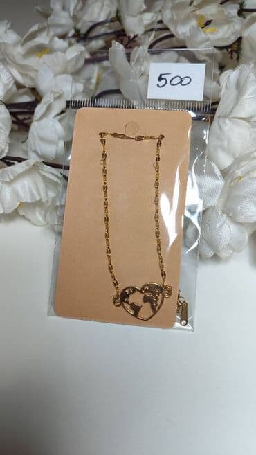 Wallets: Zlatno narukvica sa priveskom u obliku srca sa mapom sveta. - Tanki — 1
