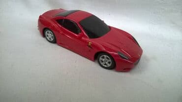 popit igračka na baterije: Na daljinski Burago Ferrari California,sa originalnim daljinskim i — 2