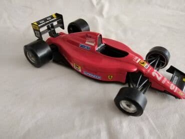 maketa automobila: Burago formula 1 Ferrari fali prednji desni spojler,zalepljena osovina — 1