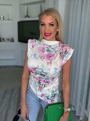 bluze tunike: Ženska elegantna bluza bez rukava sa floralnim printom
1400 din — 2
