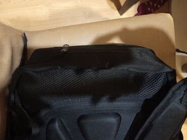 Trotineti, skejtbordovi i hoverbordovi: Crni ranac. Made in Swiss ojacan. Nеma ostecenja .Duzina 50cm,sirina — 8