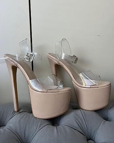 Nude platforme u stilu Pleaser, sa providnim kaišićima, model koji