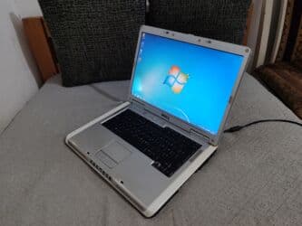 Packard Bell: 2 GB OZU, 15.4 " — 2