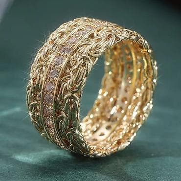 van cleef nakit cena: Zlatni prsten široke burme sa bogatim pletenim motivom i centralnim — 2